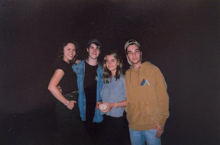 Four friends posing for a photo
