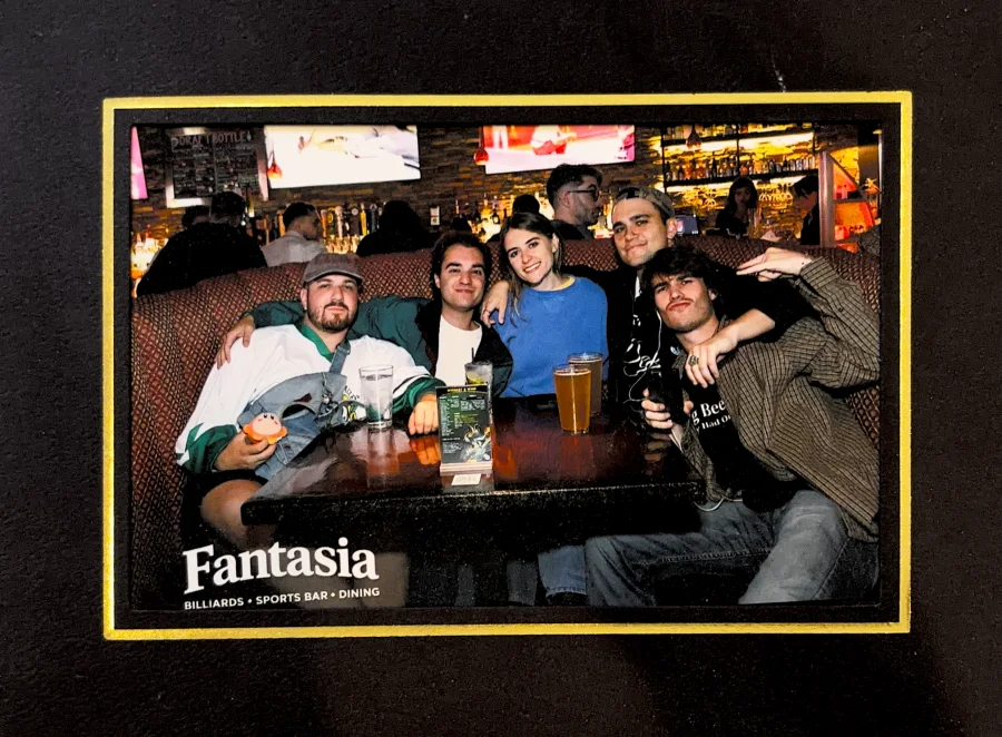 A framed group photo at Fantasia billiards